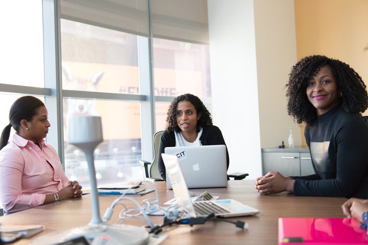 KCG team collaborating in a business meeting